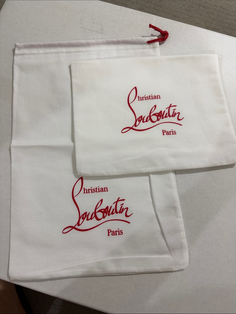 Christian Louboutin White Dust Bags with Red Logo Set of 2 new